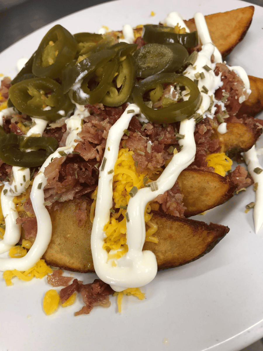 loaded potato wedges with bacon cheese jalapenos and sauce